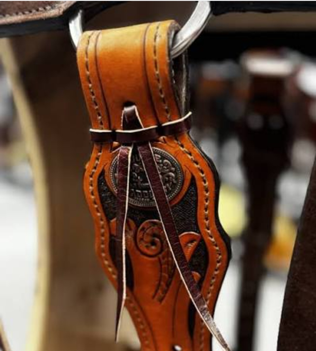 Hand-tooled leather saddle detail