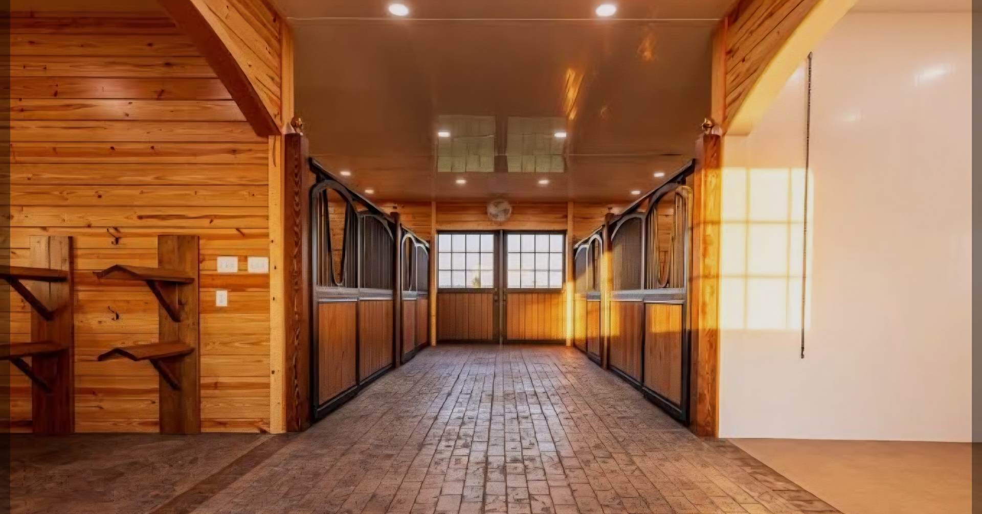 Premium stable aisle with warm natural light